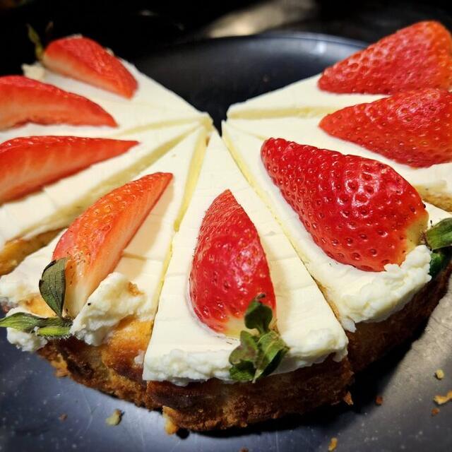Strawberry cheesecake sliced into portions